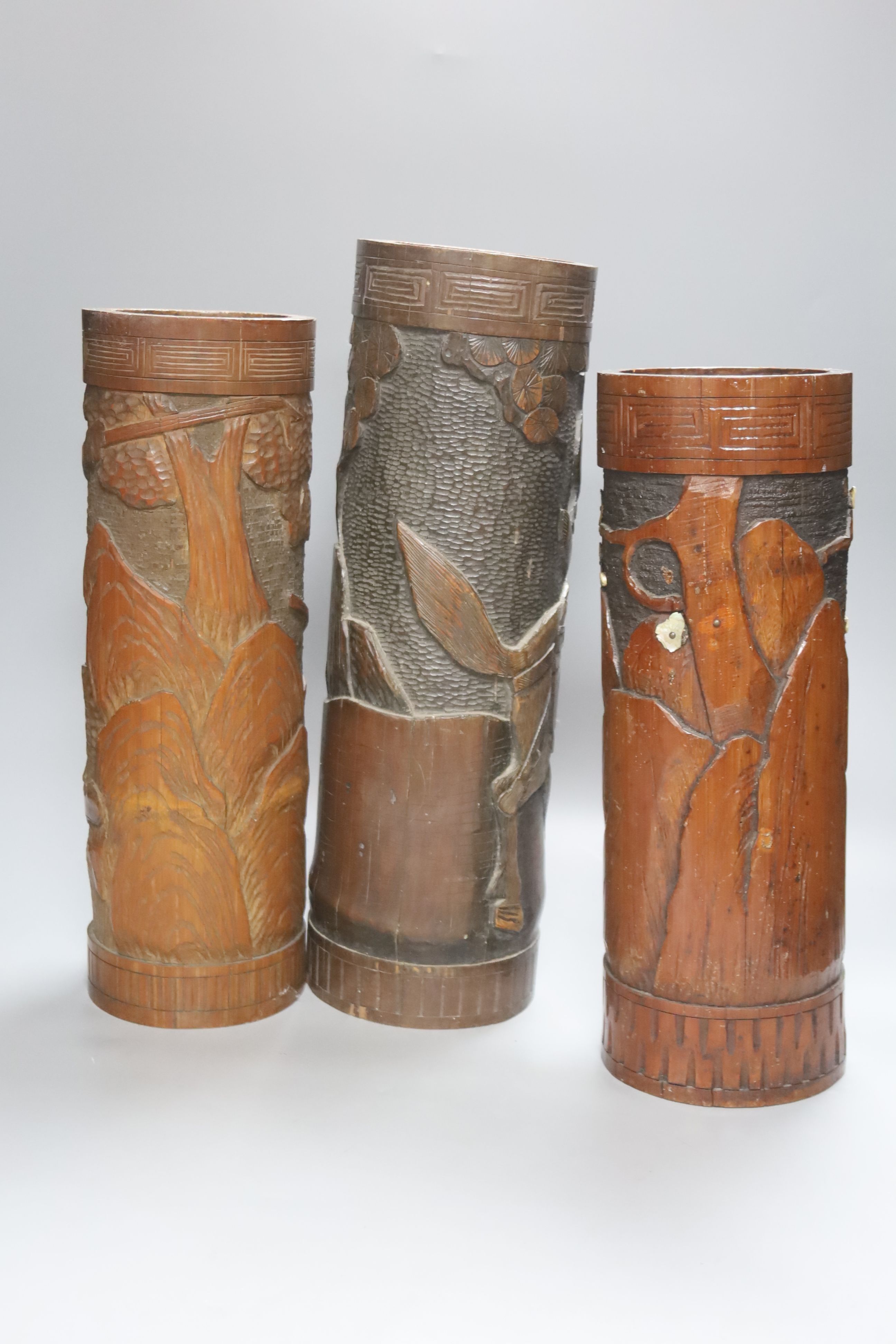 Three Japanese carved bamboo brush pots, 19th/20th century, tallest 40cm